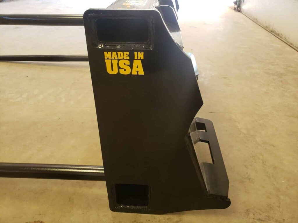 Close up of Stinger BS1 bale spear attachment side plate with Made in USA marking