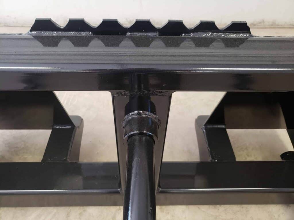 Close up of Stinger BS1 skid steer bale spear frame showing reinforced steel construction
