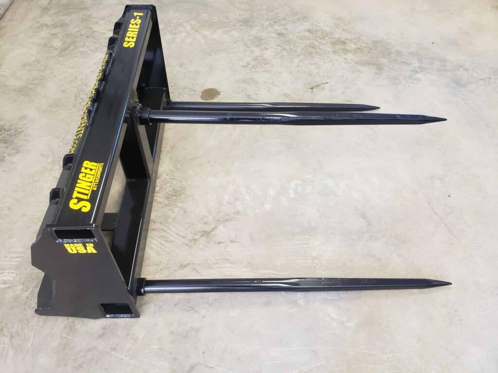 Stinger BS1 skid steer bale spear attachment with dual heavy duty spears for handling round hay bales on farms