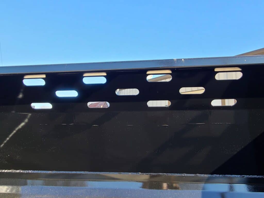 Close up of Stinger SNB skid steer snow bucket attachment bucket edge and steel panel