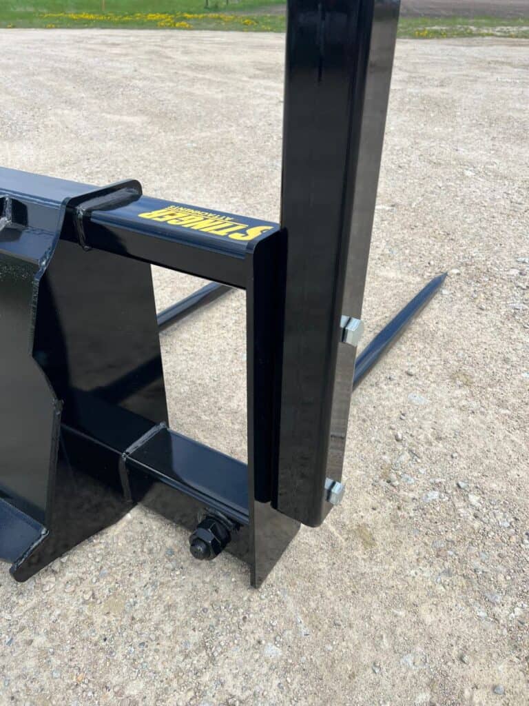 Stinger BS4 skid steer bale spear close up of main spear mount showing reinforced sleeve and heavy duty construction