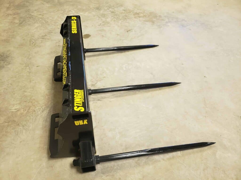Stinger BS3 skid steer bale spear attachment top view with bale spikes
