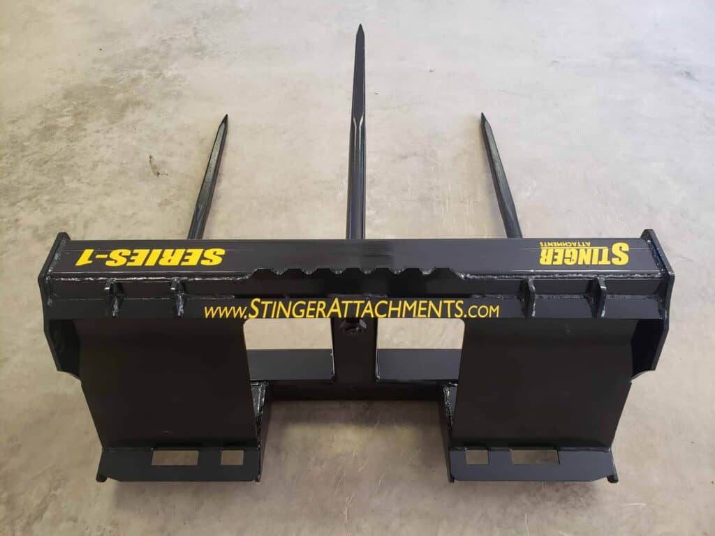 Top view of Stinger BS1 skid steer bale spear attachment showing heavy duty frame and dual spear design