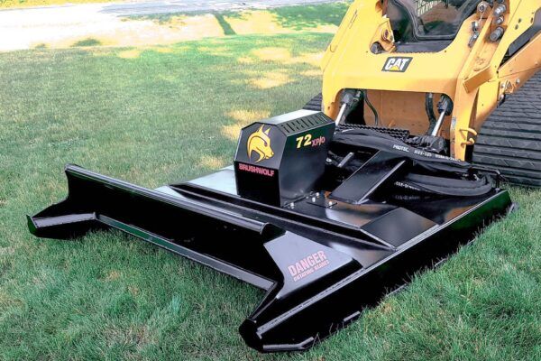 Close up Brush Wolf extreme duty skid steer brush cutter deck showing heavy duty blade carrier
