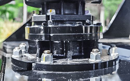 Brush Wolf Alpha XP skid steer brush cutter bearing housing and drive assembly close up