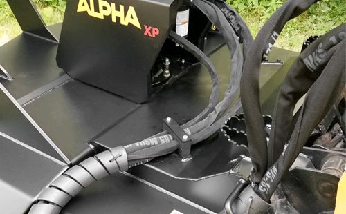 Brush Wolf Alpha XP skid steer brush cutter hydraulic hoses routed safely along mower frame