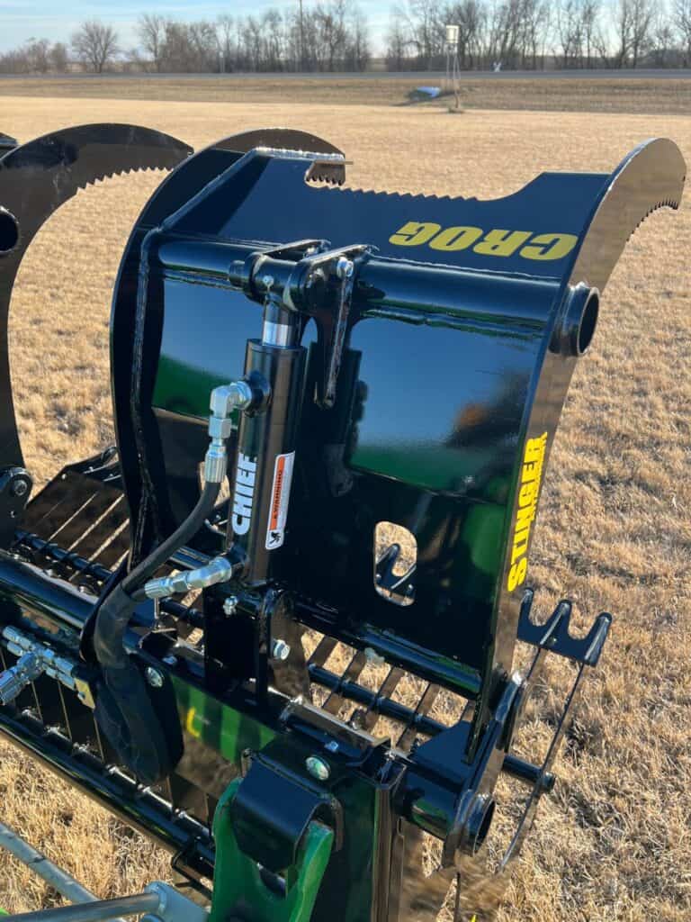 Stinger CROC compact rock grapple skid steer attachment rear angle showing heavy duty frame