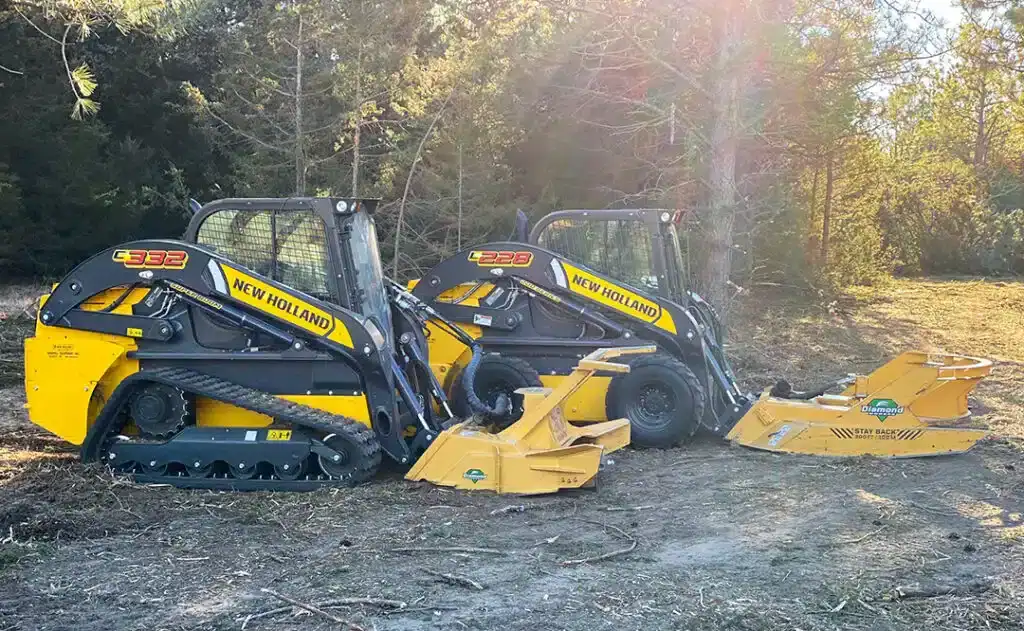 Diamond Mowers Pro X skid steer disc mulcher mounted on New Holland loader showing compatibility and cutting performance