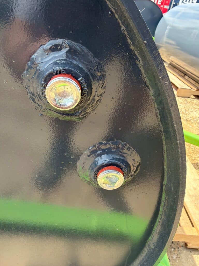 ECHO LR lawn roller axle close up showing heavy duty bung and welds for durability under full water load