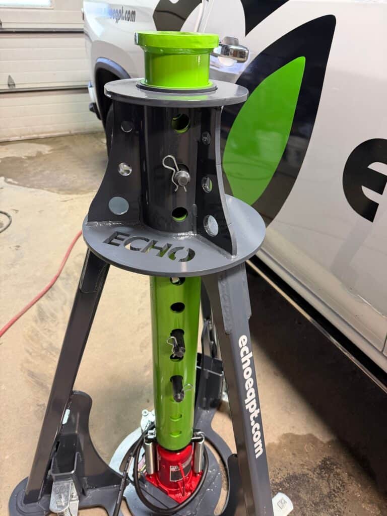 ECHO pneumatic jack close up showing top plate and frame detail for heavy duty agricultural lifting applications