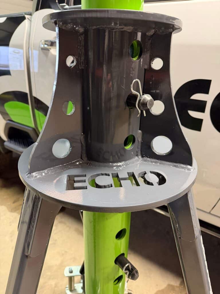 ECHO pneumatic jack frame with pin and safety clip showing secure locking system for stable lifting operation