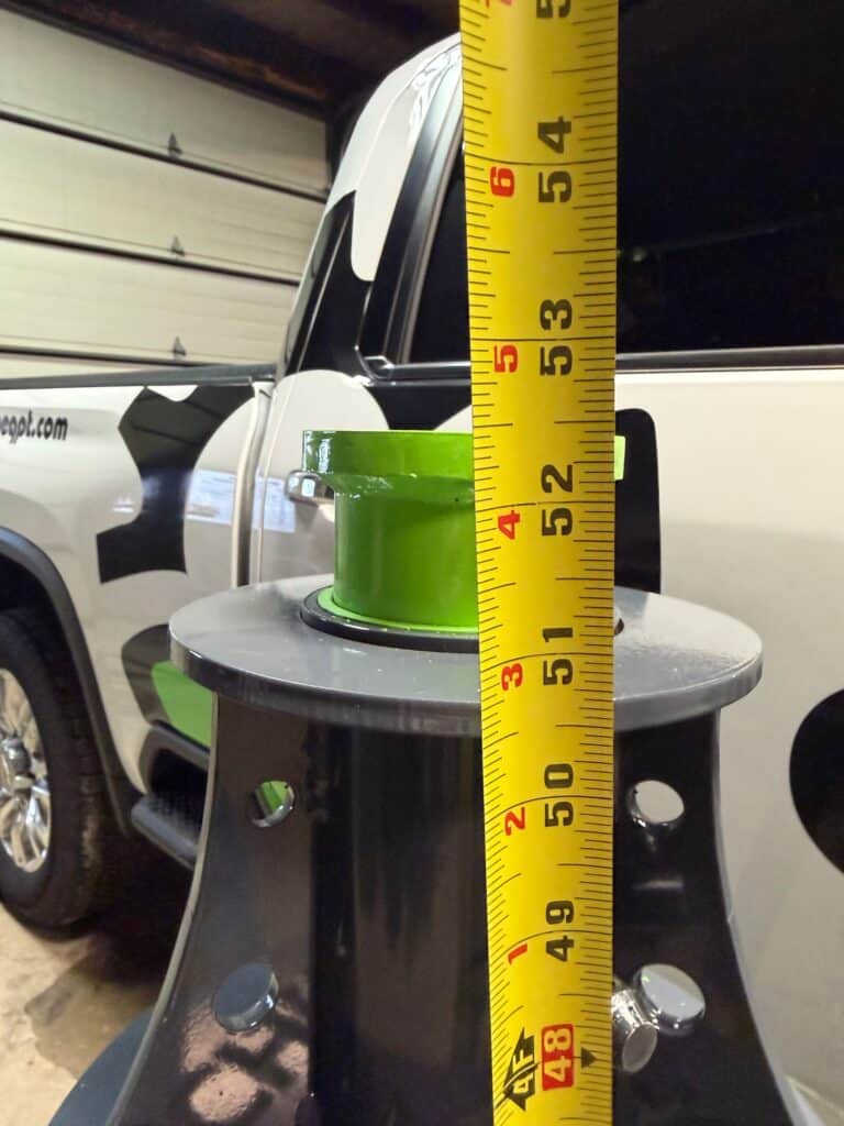 ECHO 20 ton pneumatic agricultural jack fully extended showing maximum lift height for servicing large equipment