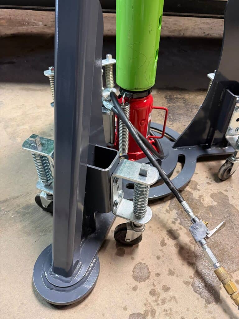 ECHO pneumatic jack regulator close up showing air pressure control for safe and controlled lifting