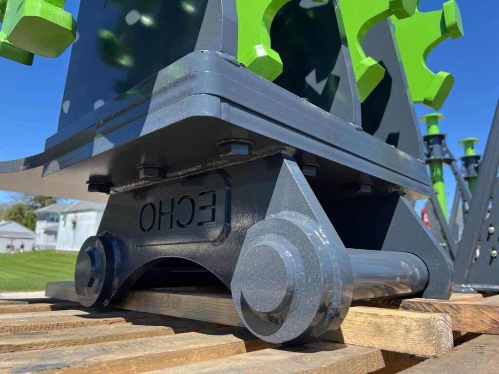 Excavator compaction wheel mount detail designed for trench backfill and soil compaction