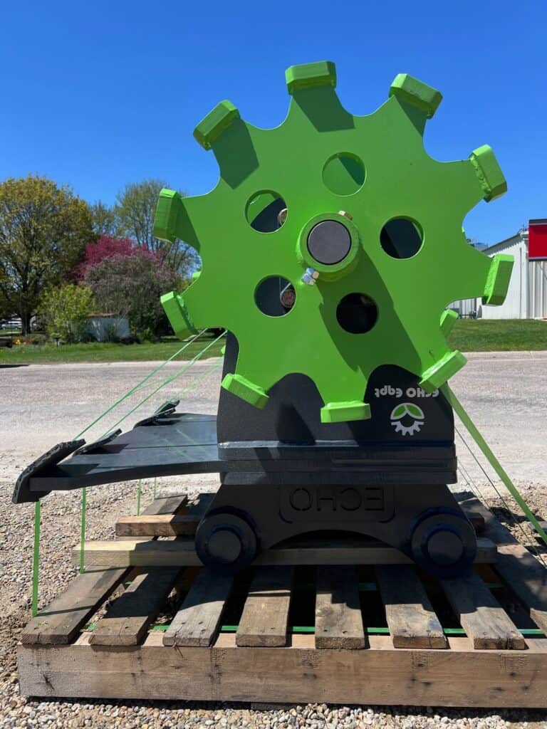 Side profile excavator compaction wheel attachment for compacting dirt and trench backfill