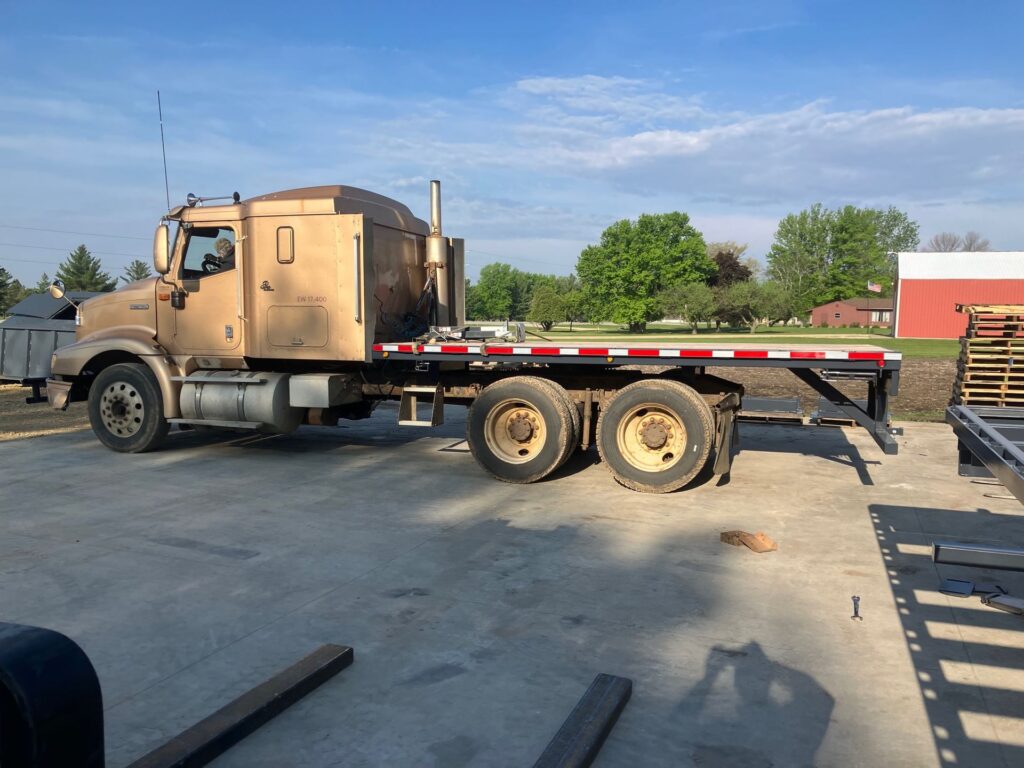 ECHO SS Super Skid removable flatbed system mounted on tandem semi truck