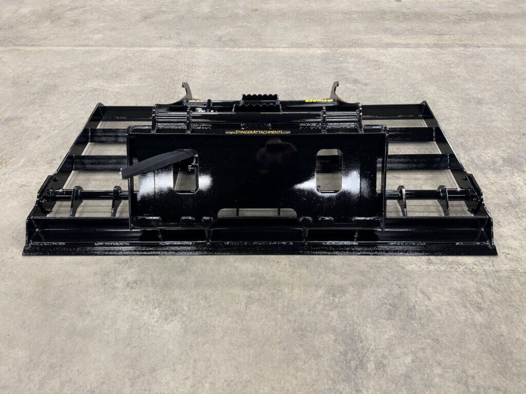 Stinger LP skid steer land plane attachment bottom view showing grading blades and reinforced structure