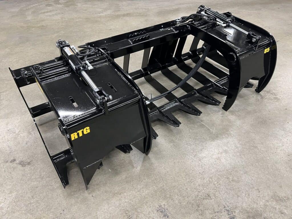 Stinger RTG tractor root grapple attachment designed for forestry, land clearing and debris handling