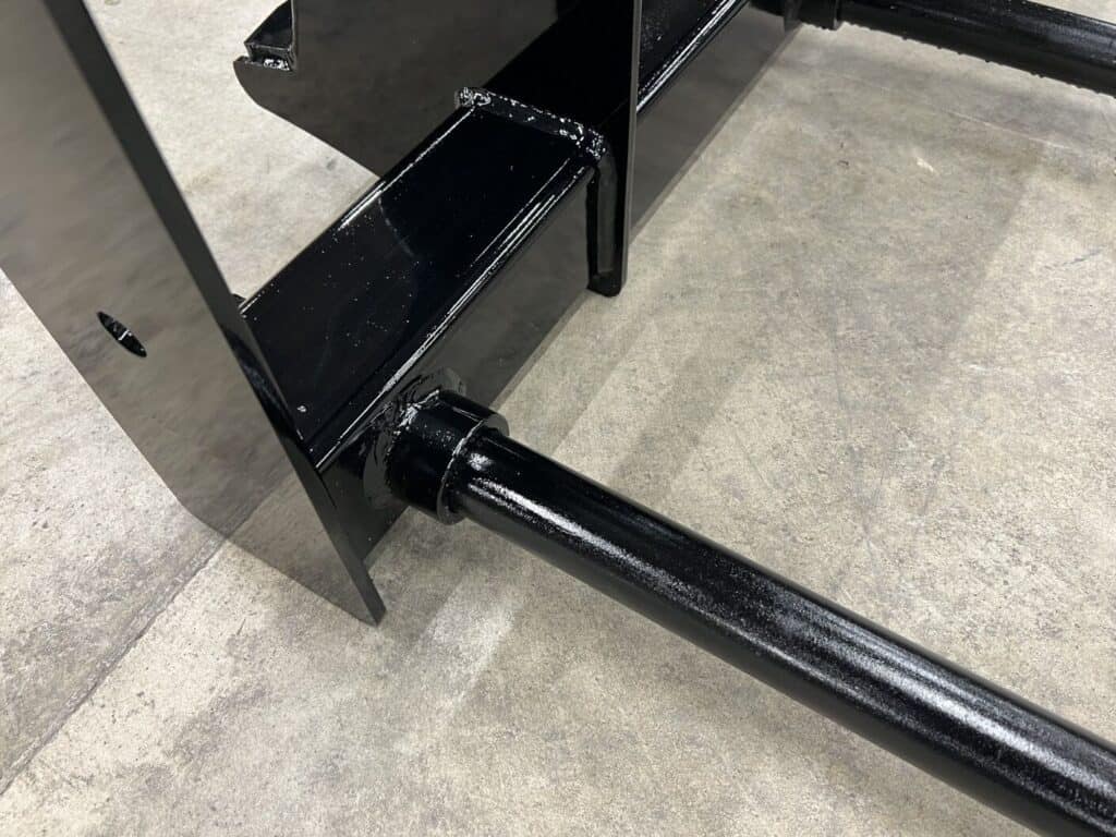 Stinger BS4 skid steer bale spear close up of main spear mount showing reinforced sleeve and heavy duty construction