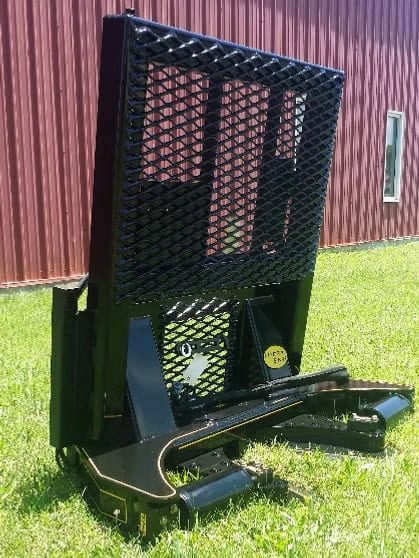 Protective mesh guard on M&M Hydra Snip 12 inch skid steer tree shear attachment