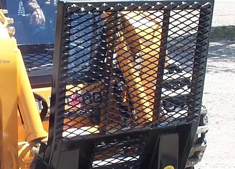 Rear safety guard on M&M Hydra Snip 12 inch skid steer tree shear attachment