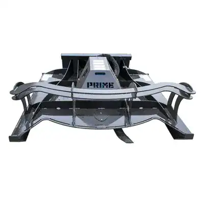 Prime Attachments direct drive skid steer brush mower angled view showing deck design, mounting plate, and cutting angle