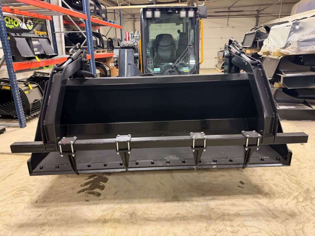 Prime Attachments high capacity skid steer grapple front view showing wide bucket opening and grapple arms