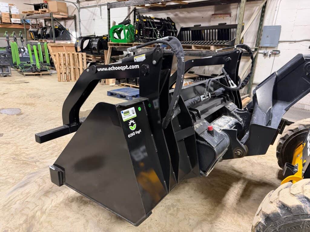 Prime Attachments high capacity skid steer grapple left side view showing heavy duty frame and grapple arms