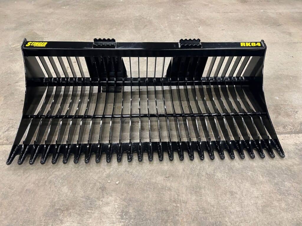 Stinger RK rock bucket right side view showing reinforced side plates and full depth tine layout