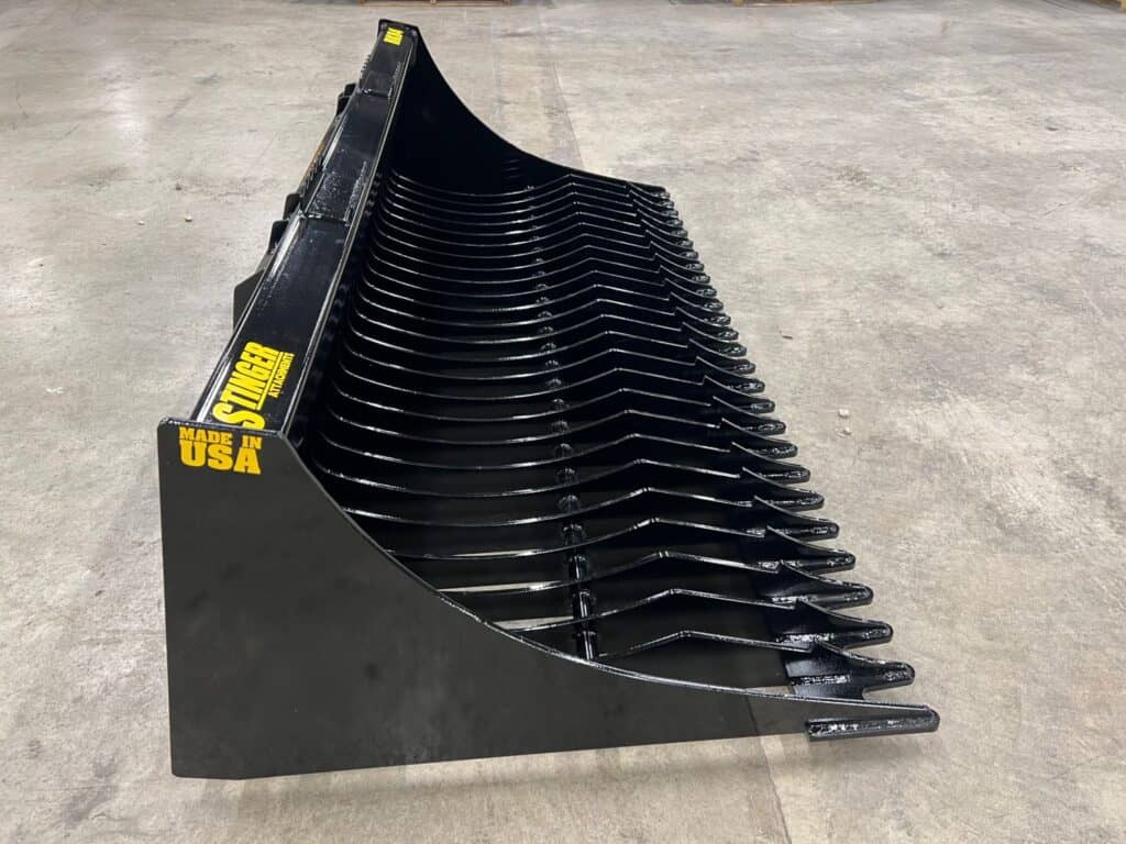 Stinger RK rock bucket right side view showing reinforced side plates and full depth tine layout