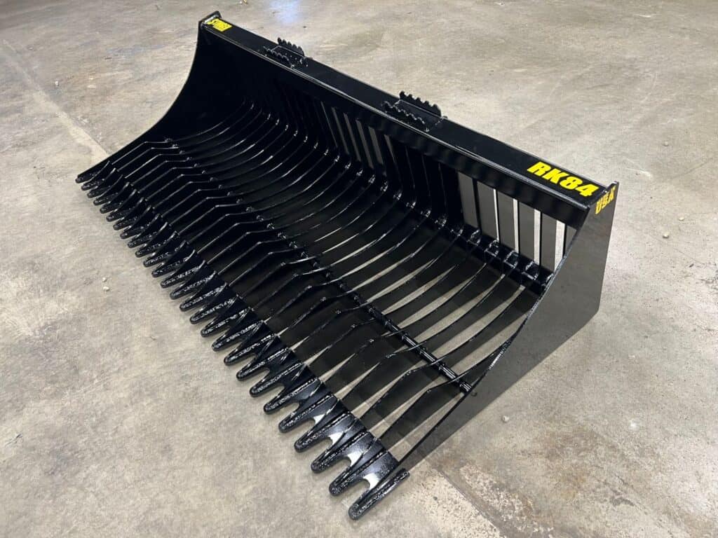 Stinger RK rock bucket warehouse angle showing deep bucket profile and heavy duty tine construction