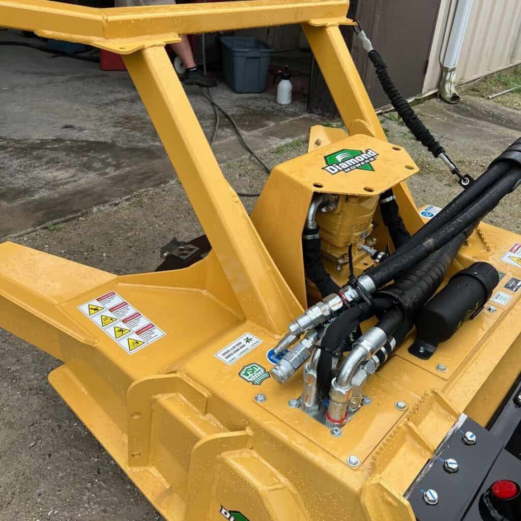 Diamond Mowers SK skid steer disc mulcher attachment frame and mounting structure for heavy land clearing work
