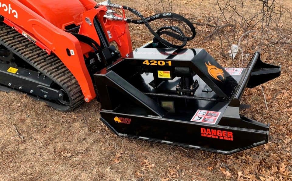 Mini skid steer brush cutter attachment cutting brush and vegetation