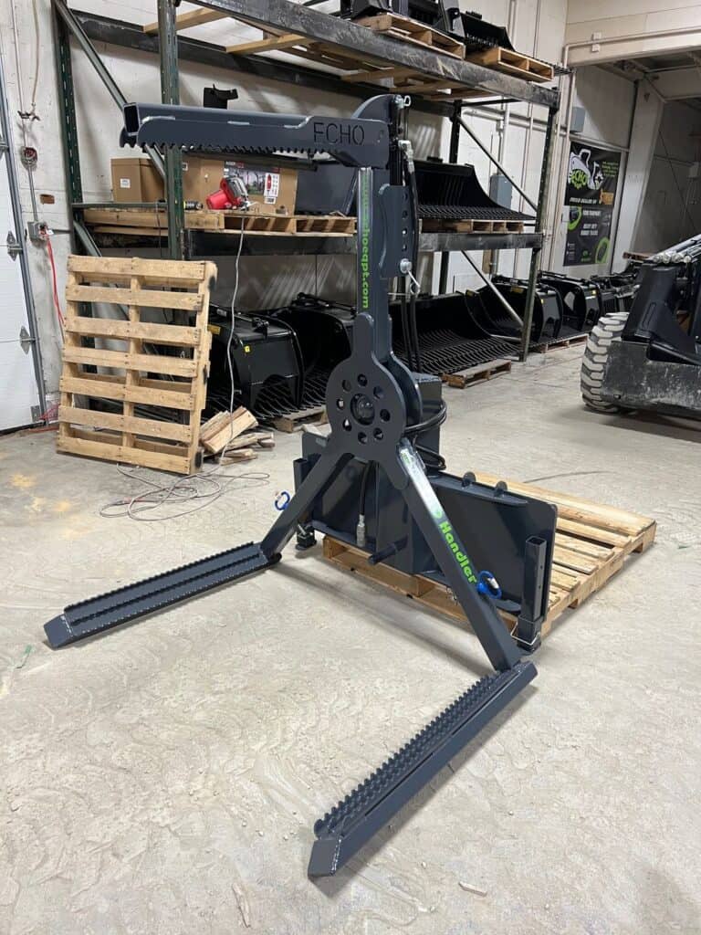 ECHO OG skid steer tire handler attachment stored inside equipment warehouse