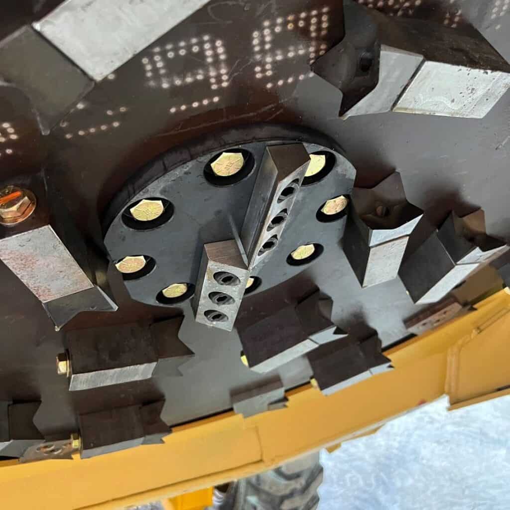 Close up of Diamond Mowers SK skid steer disc mulcher cutting disc with carbide teeth for forestry mulching