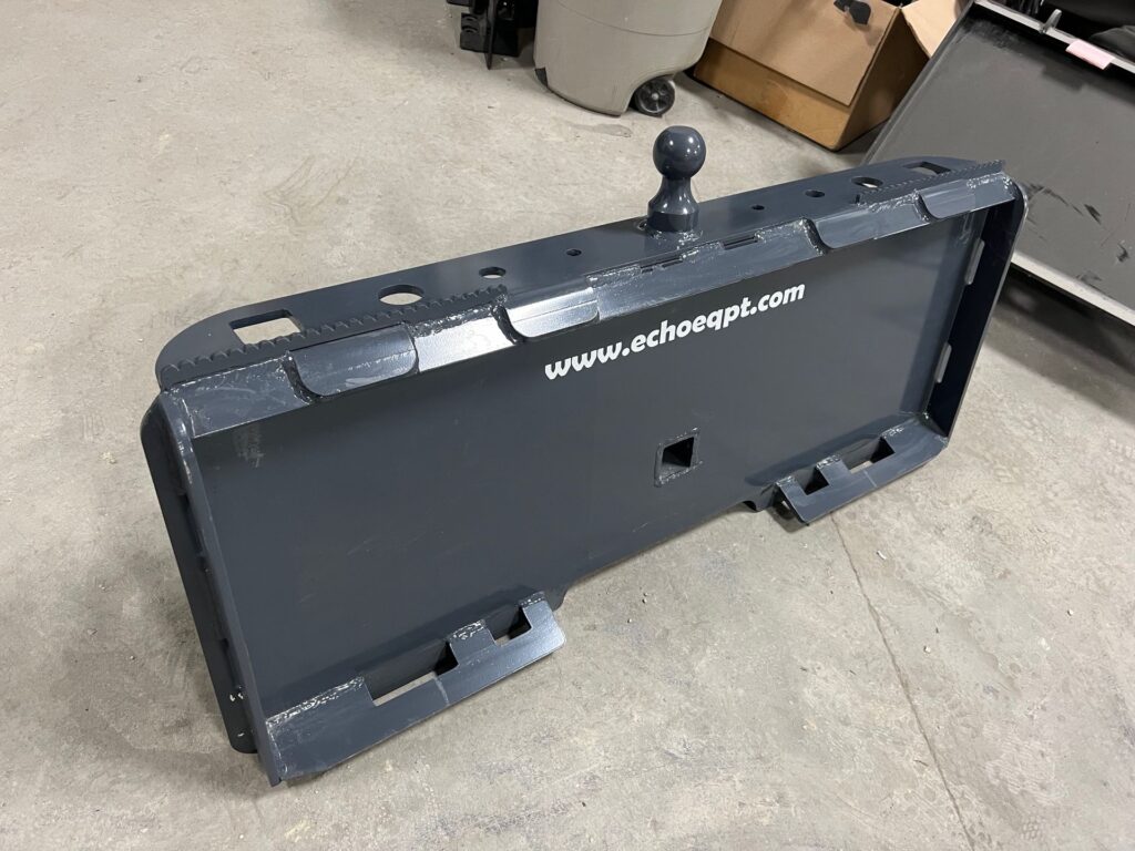 Heavy duty skid steer trailer mover attachment with hitch ball for moving trailers