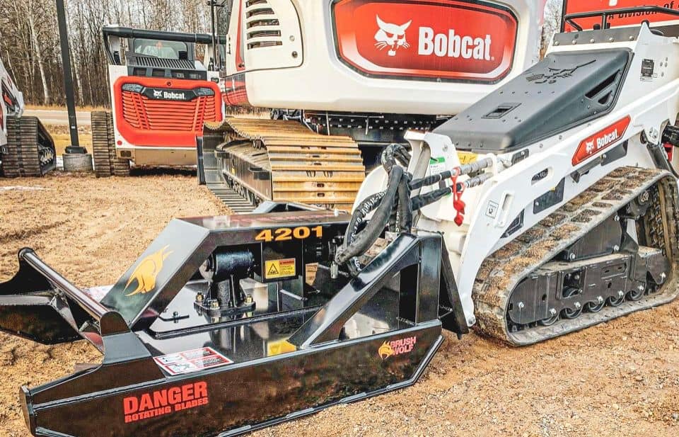 Bobcat mini skid steer running Brush Wolf open front brush cutter