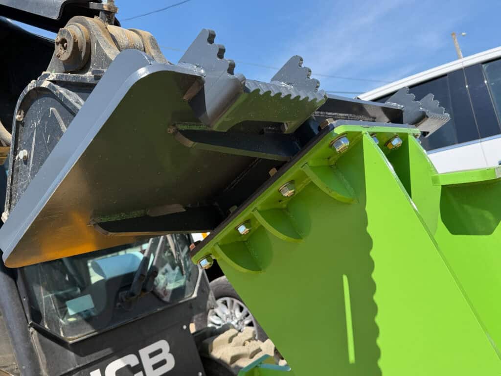 Close-up of the reinforced mounting plate, gussets and bolted frame on the ECHO 48 inch skid steer compaction wheel