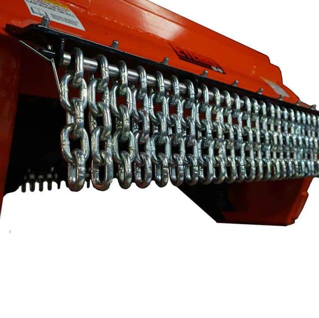 Eterra EX-40 excavator flail mower chain guard protecting operator from debris during brush mowing