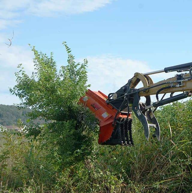 Eterra EX-30 excavator flail mower trimming trees showing precision cutting for roadside and ditch maintenance