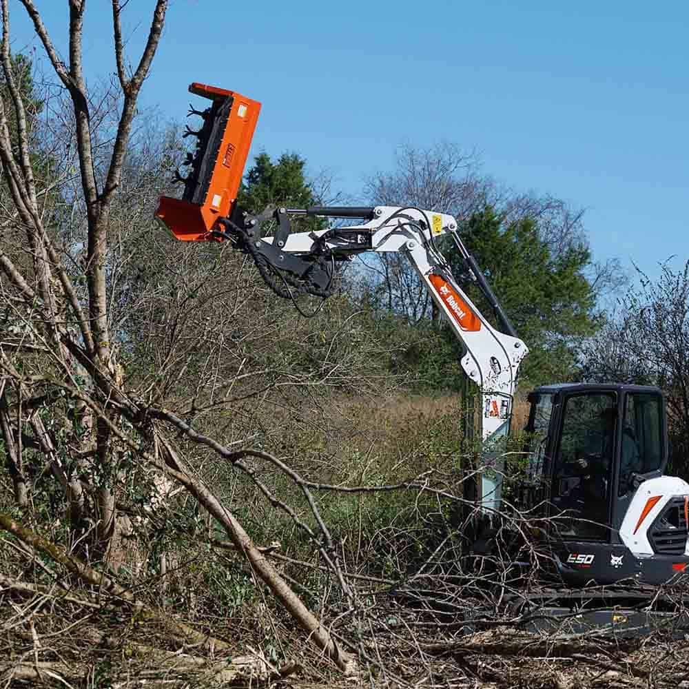 Eterra EX-40 excavator flail mower trimming tree branches with excavator mounted vegetation management tool