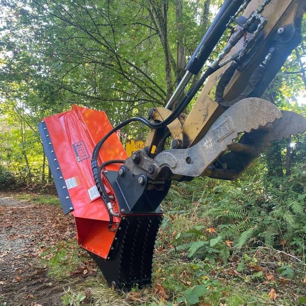 Eterra EX-40 excavator flail mower back of the mower from the operators view taking out brush and trees