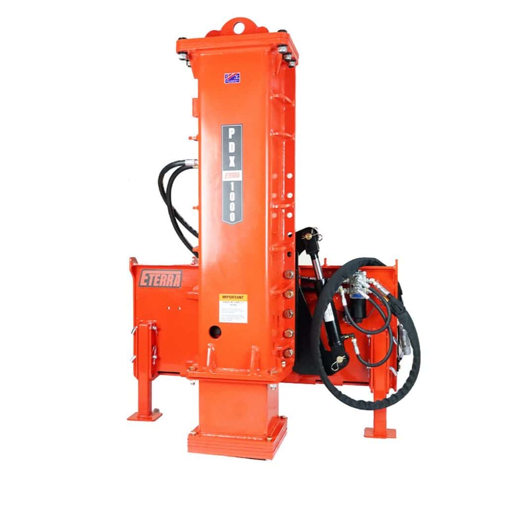 Close up Eterra PDX-1000 skid steer hydraulic post driver showing steel frame and hydraulic hammer assembly