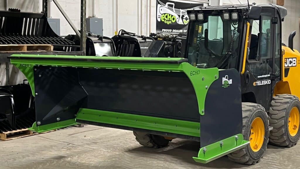 ECHO SSP skid steer snow pusher attachment mounted on skid steer for commercial snow removal