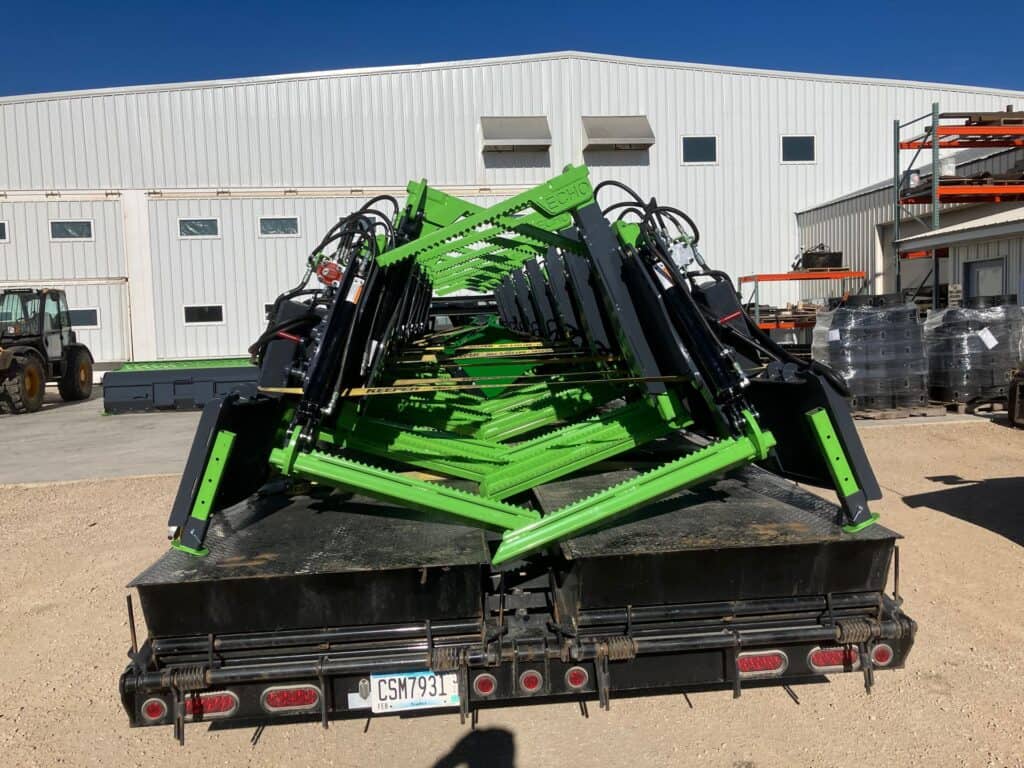 ECHO Handler X3 tire grabbers stacked on flatbed trailer ready for shipment