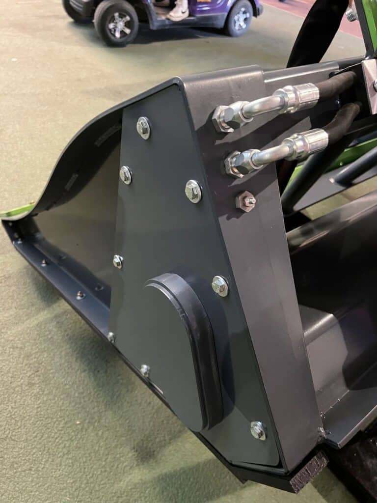 Hydraulic cylinder connections on ECHO PG3 skid steer power grader attachment