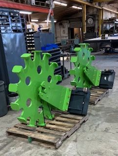 ECHO SSCW skid steer single compaction wheel attachment inside manufacturing facility
