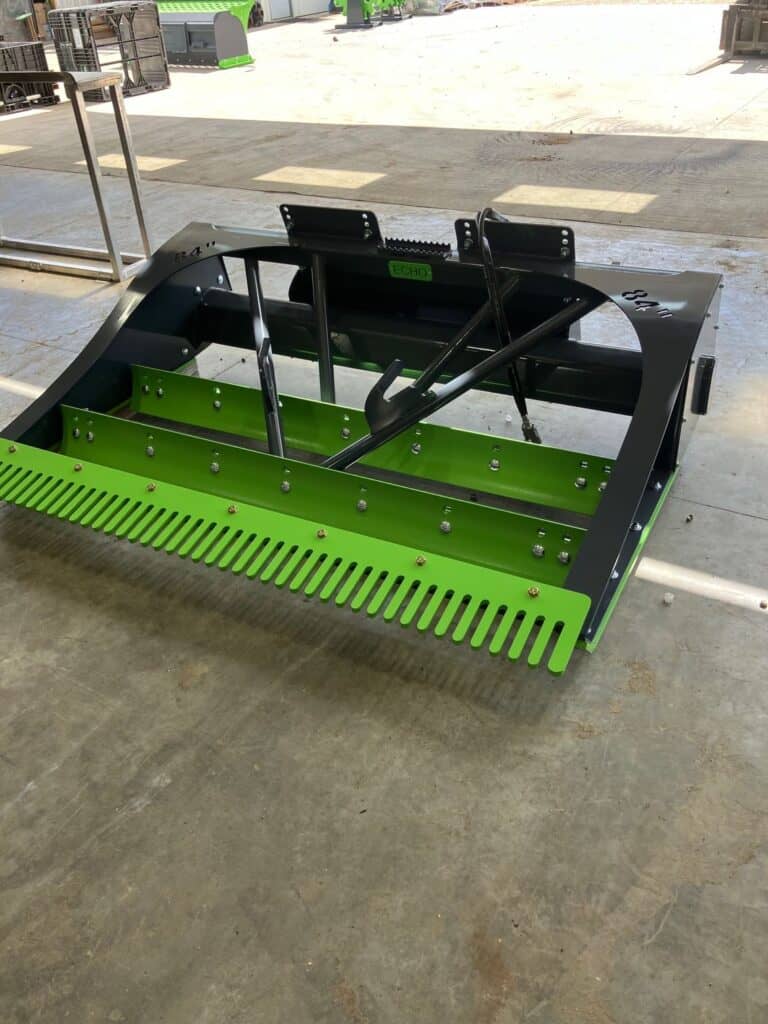 Rear frame and grading blade system on ECHO PG3 skid steer power grader attachment