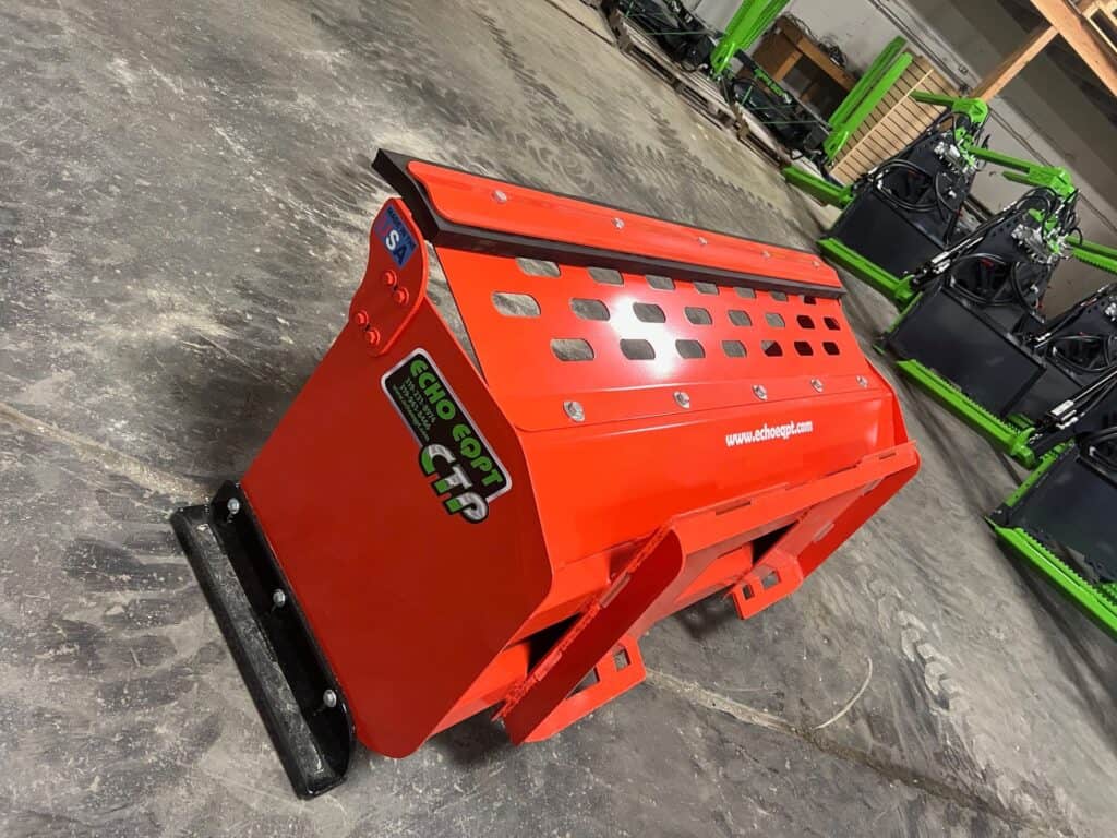 Echo Equipment compact tractor pusher attachment for clearing snow and moving material