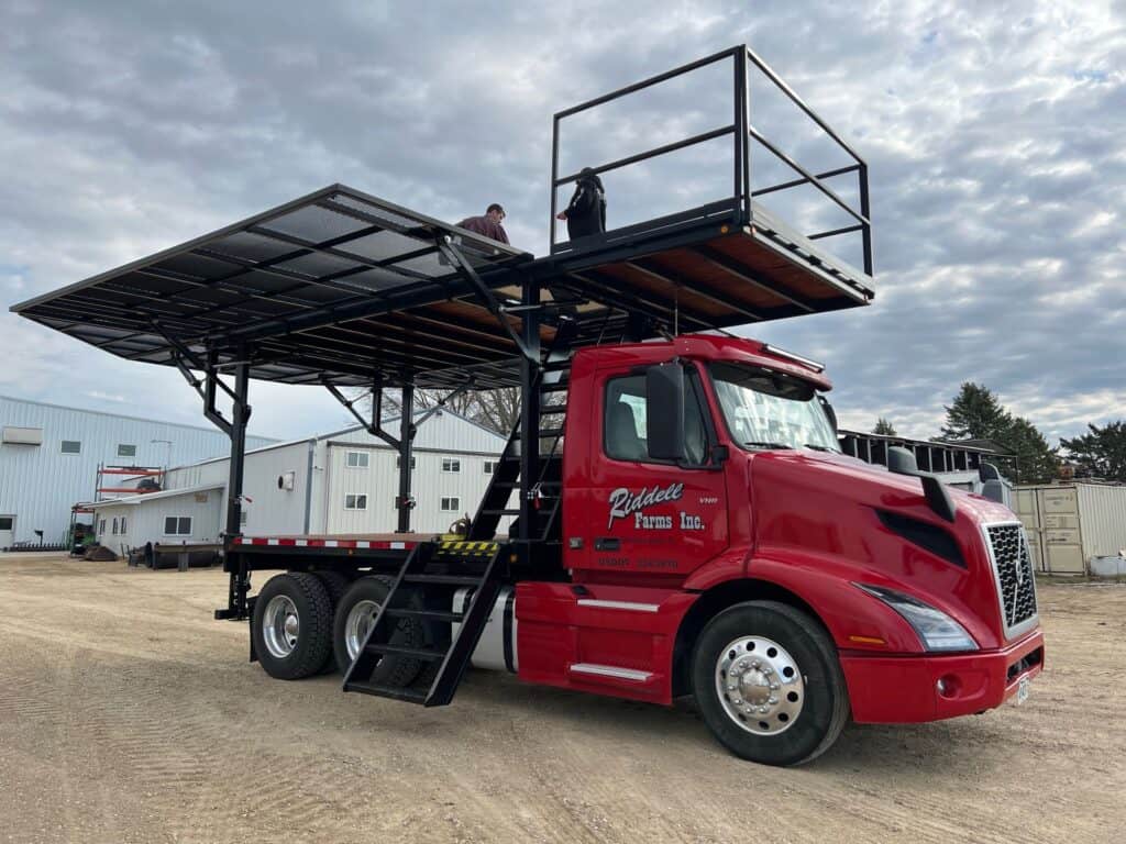 Semi truck mounted ECHO SS Drone Skid platform raised for agricultural drone loading